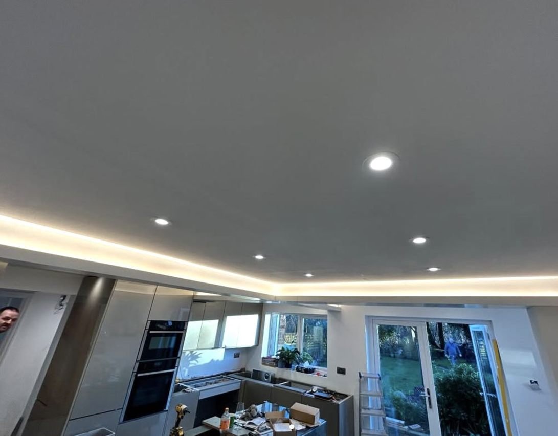 Kitchen with downlights and LED strip lighting